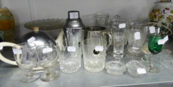 A STEEL COCKTAIL SHAKER, PEWTER PINT TANKARD, MOULDED GLASS GOBLET, GLASS CAKE STAND AND