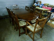 A DARK WOOD PRIORY JACOBEAN STYLE DINING ROOM SUITE OF 10 PIECES, TO INCLUDE; A LARGE DISPLAY