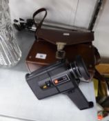 GAF 712 REFLEX ZOOM SUPER 8 MOVIE CAMERA, IN LEATHER CASE AND A CAMERA TRIPOD