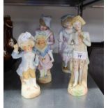 FIVE MODERN TINTED BISQUE FIGURES, including two pairs, unmarked, 9? (22.9cm) high and smaller, (
