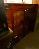 A VICTORIAN MAHOGANY SUPERSTRUCTURE BOOKCASE, ENCLOSED BY TWO GLAZED DOORS (3'10" WIDE X 4'6" HIGH)