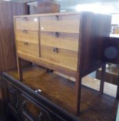 A HARDWOOD CHEST OF THREE PAIRS OF SHORT DRAWERS, BRONZE HOOK HANDLES ON STRAIGHT LEGS (2'10" wide x