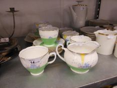 GRAFTON 1930's ART DECO CHINA TEA SERVICE FOR SIX PERSONS, PAINTED WITH GREEN AND YELLOW FLOWERS