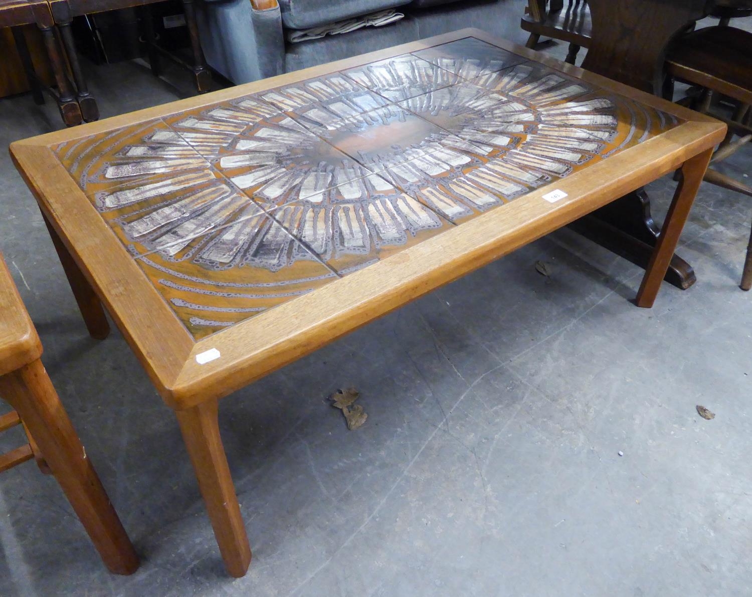 A DANISH TEAK MOBELFABRIKKEN TOFTEN TILE TOP OBLONG COFFEE TABLE, RAISED ON STRAIGHT SUPPORTS, 112cm