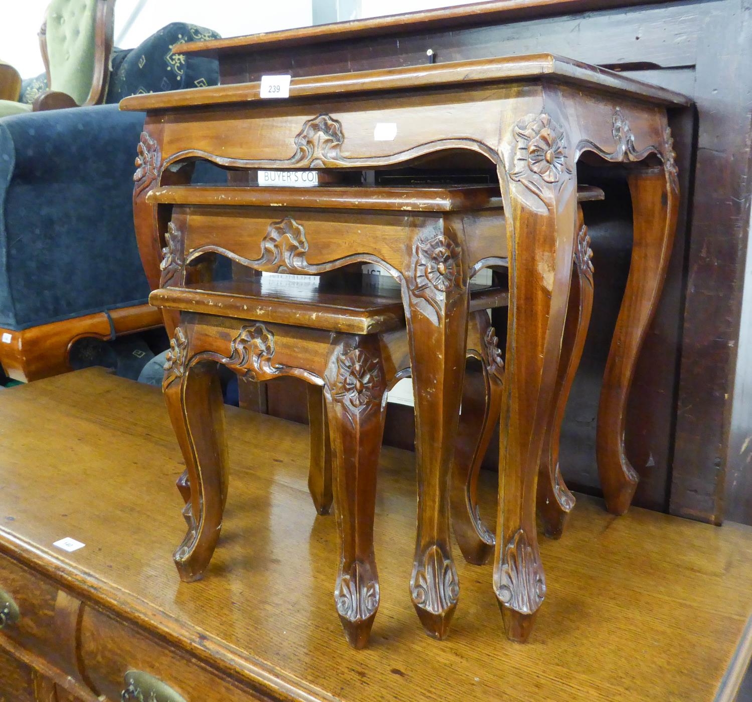 A NEST OF THREE MAHOGANY COFFEE TABLES