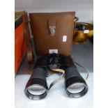 A PAIR OF POLARIS 12 x 15 MAGNIFICATION BINOCULARS IN CASE