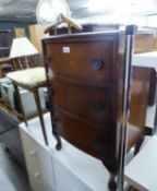 1950?s WALNUT BOW FRONTED BEDSIDE CHEST OF THREE DRAWERS AND A BEDROOM METAMORPHIC SINGLE CHAIR, THE