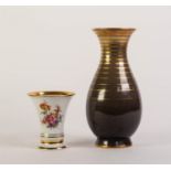 TWO FURSTENBERG, GERMAN PORCELAIN VASES, one of trumpet form, printed and painted with floral