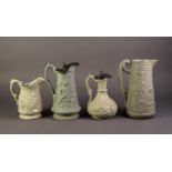 THREE NINETEENTH CENTURY GREEN GLAZED AND RELIEF MOULDED POTTERY JUGS, comprising: ONE ATTRIBUTED TO