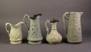 THREE NINETEENTH CENTURY GREEN GLAZED AND RELIEF MOULDED POTTERY JUGS, comprising: ONE ATTRIBUTED TO