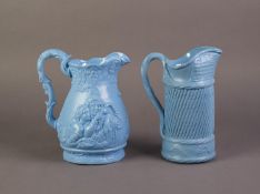 TWO UNATTRIBUTED NINETEENTH CENTURY BLUE GLAZED AND RELIEF MOULDED POTTERY JUGS, one PRODUCED TO