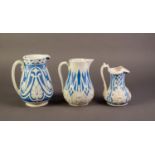 COPELAND OR ATTRIBUTED TO, TWO NINETEENTH CENTURY RELIEF MOULDED POTTERY JUGS, with designs of