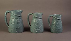 ATTRIBUTED TO RIDGWAYS, GRADUATED SET OF THREE NINETEENTH CENTURY MOULDED AND BLUE GLAZED POTTERY