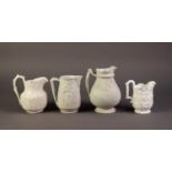 FOUR NINETEENTH CENTURY WHITE GLAZED AND RELIEF MOULDED POTTERY JUGS, comprising: ONE ATTRIBUTED