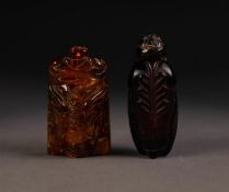 CHINESE CARVED DARK AMBER SNUFF BOTTLE AND STOPPER, in the form of a cicada, 2 3/8in (6cm) long