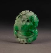 CHINESE SHADED GREEN JADE OVAL PANEL, pierced and carved in alto relief with a dragon with head