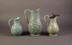 WILLIAM BROWNFIELD OR ATTRIBUTED TO, THREE NINETEENTH CENTURY RELIEF MOULDED POTTERY JUGS IN