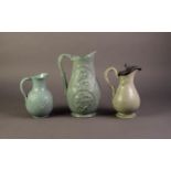 WILLIAM BROWNFIELD OR ATTRIBUTED TO, THREE NINETEENTH CENTURY RELIEF MOULDED POTTERY JUGS IN