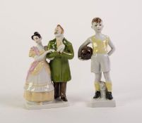 TWO MODERN RUSSIAN PORCELAIN FIGURES, one modelled as a young boy holding a football, the other as a