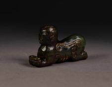 CHINESE ANTIQUE CARVED DARK BROWN JADE SPHINX SHAPED FIGURE, 2 3/4in (7cm) long, 1 5/8in (4cm) high