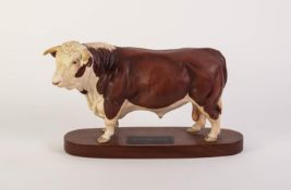 BESWICK ?CONNOISSEUR CHINA MODEL OF A HEREFORD BULL, on mahogany base with plaque, 7 ½? (19cm)