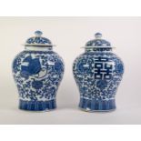 MODERN PAIR OF CHINESE BLUE AND WHITE PORCELAIN VASES AND COVERS, each of baluster form with domed