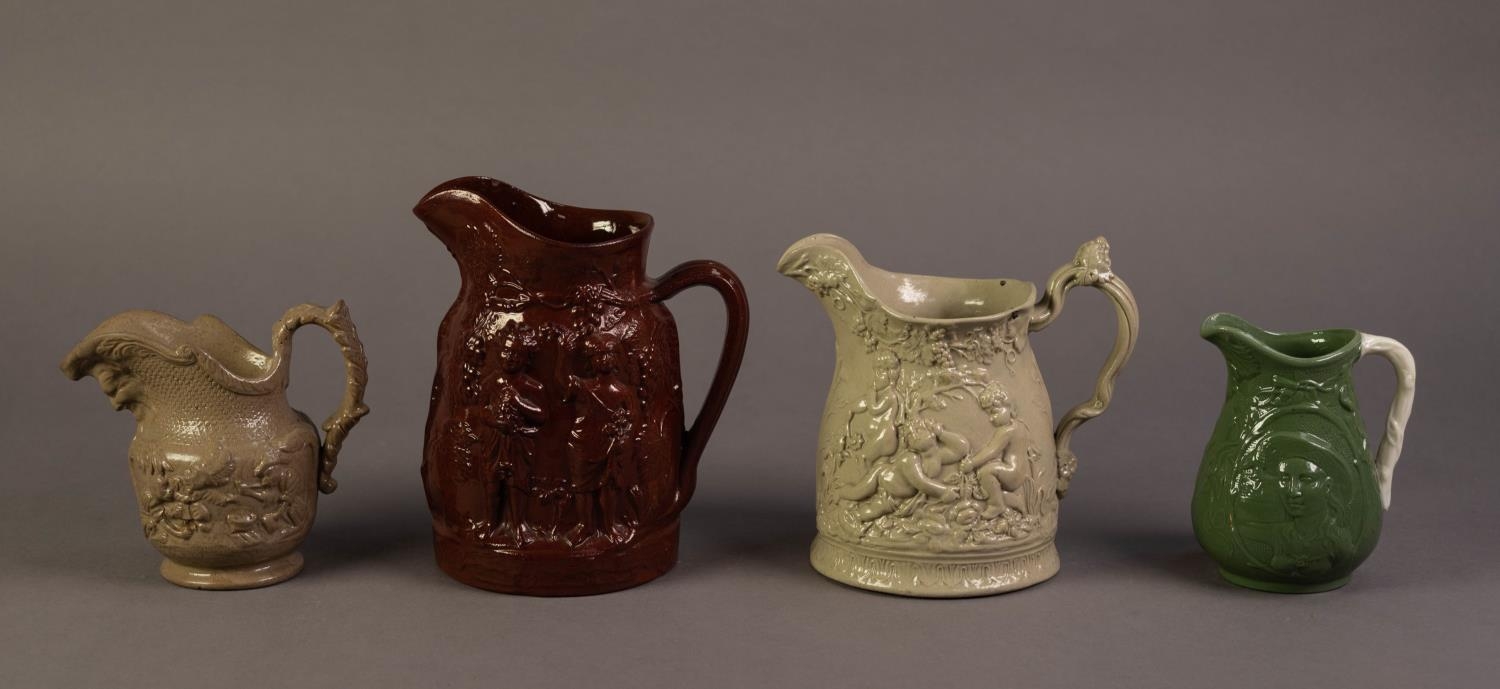 FOUR UNATTRIBUTED NINETEENTH CENTURY RELIEF MOULDED JUGS IN COLOURED GLAZES, comprising: ONE IN - Image 2 of 2