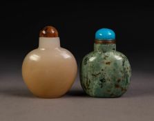 CHINESE PALE GREEN AND BLACK SPECKLED HARDSTONE SNUFF BOTTLE AND DOMED BLUE STOPPER, 2 1/2" (6cm)