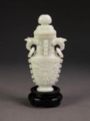 CHINESE CARVED WHITE JADE VASE AND COVER of flattened shaped, domed cover with bud finial, two