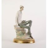 LLADRO PORCELAIN FIGURE, modelled as a young Jewish man, sat on a rocky outcrop and reading from