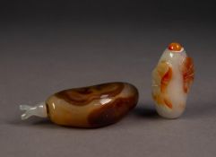 CHINESE BROWN AND WHITE JADE SNUFF BOTTLE AND STOPPER, carved with large brown lily pads, on white