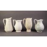 FOUR NINETEENTH CENTURY WHITE OR OFF WHITE GLAZED RELIEF MOULDED POTTERY JUGS, comprising: A ?