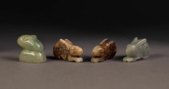 TWO CHINESE MUTTON FAT JADE SMALL MODELS OF RABBITS, 1 3/4in (4.5cm) and 1 1/2in (3.5cm) long and