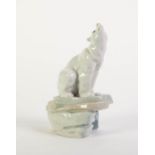 MODERN ?MADE IN SPAIN? PORCELAIN MODEL OF A POLAR BEAR, painted in muted tones and well modelled