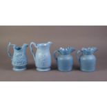 FOUR UNATTRIBUTED NINETEENTH CENTURY BLUE GLAZED AND RELIEF MOULDED POTTERY JUGS, comprising TWO