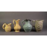 FOUR NINETEENTH CENTURY RELIEF MOULDED POTTERY JUGS, comprising, TWO BUFF GLAZED EXAMPLES, ONE