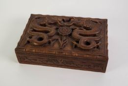 TWENTIETH CENTURY ORIENTAL CARVED HARDWOOD JEWELLERY BOX, of typical form with lift-out tray, the