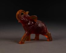 MODERN DAUM AMBER MOULDED GLASS MODEL OF AN ELEPHANT, modelled with trunk raised, 3 ¾? (9.5cm) high,