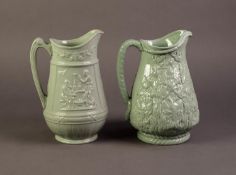 DUDSON OR ATTRIBUTED TO, TWO NINETEENTH CENTURY RELIEF MOULDED AND GREEN GLAZED POTTERY JUGS, one