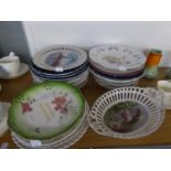 TWENTY FIVE CONTINENTAL PORCELAIN RIBBON SOUVENIR AND OTHER PLATES, ALSO A PIERCED BORDERED OVAL