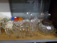 A CUT GLASS ROSE BOWL WITH WIRE GRILLE AND MISCELLANEOUS CUT GLASS WINES AND SUNDRY WINE GLASSES AND