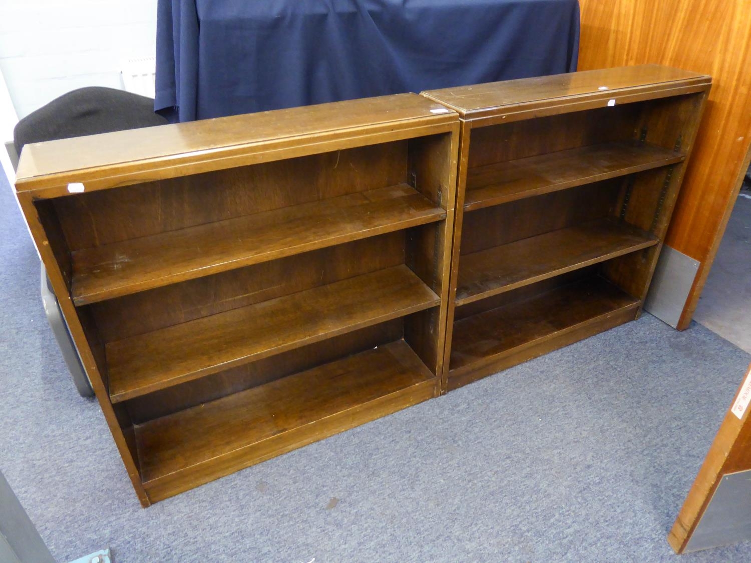 TWO MAHOGANY OPEN BOOKCASES, EACH OF THREE TIERS