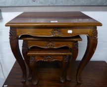 A NEST OF THREE MAHOGANY COFFEE TABLES