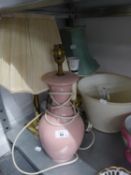 AN ALABASTER VASE TABLE LAMP AND SHADE, A LARGE PINK POTTERY VASE TABLE LAMP AND SHADE AND TWO BRASS