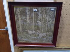 A MACHINE WOVEN TAPESTRY OF DOGS WALKING IN A WOODLAND NEAR A STREAM