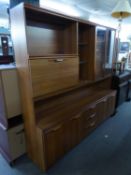 A TEAK EFFECT TALL AND WIDE SIDEBOARD WITH SUPERSTRUCTURE DISPLAY UNIT