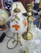 A VERY LARGE BRASS CANDLESTICK, 18 ½? HIGH AND A BRASS ELECTRIC TABLE LAMP WITH TRIPOD BASE AND