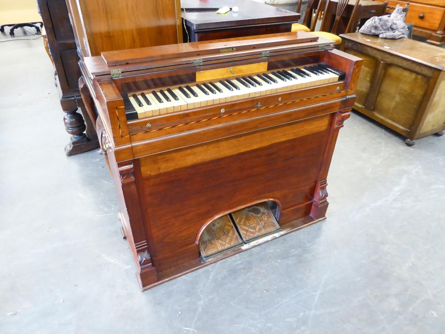 A MAHOGANY CASED FLOOR STANDING HARMONIUM, WITH CHEQUER BOARD INLAY AND BRASS HANDLES