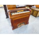 A MAHOGANY CASED FLOOR STANDING HARMONIUM, WITH CHEQUER BOARD INLAY AND BRASS HANDLES