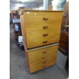 A PAIR OF TEAK CHESTS OF FOUR LONG DRAWERS, EACH WITH A SINGLE WOOD HANDLE, EACH 2?9? WIDE